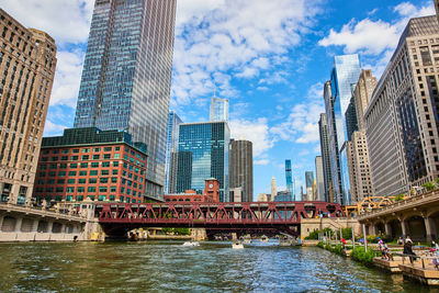 Buildings in city against sky