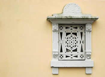 Patterned window on wall