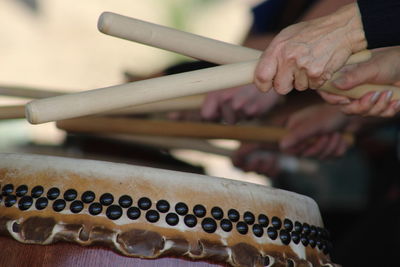 Musicians playing drums