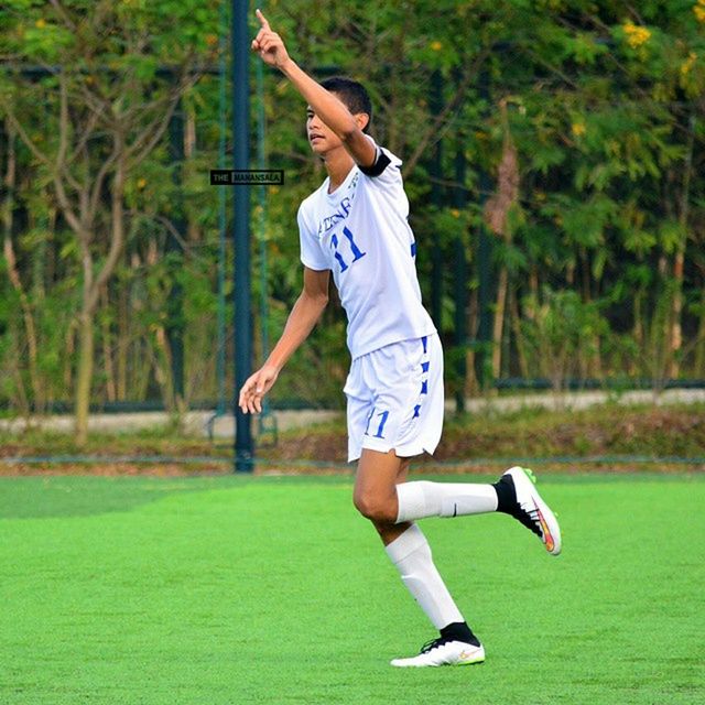 full length, lifestyles, sport, jumping, mid-air, leisure activity, tree, grass, vitality, skill, fun, motion, green color, balance, enjoyment, playing, childhood, running