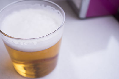High angle view of beer glass on table