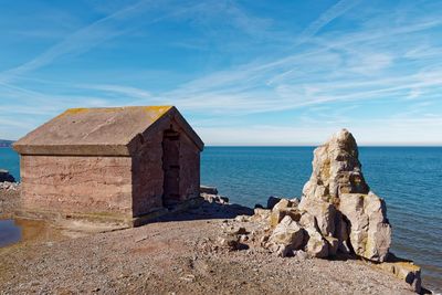 Scenic view of sea against blue sky