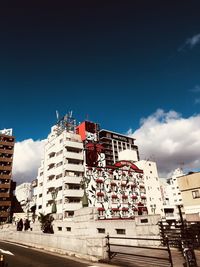 Low angle view of buildings in city against sky