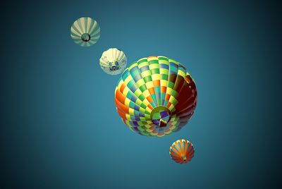 Hot air balloons against sky