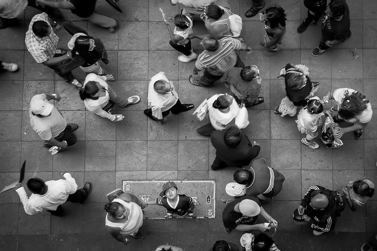 HIGH ANGLE VIEW OF PEOPLE AT TABLE