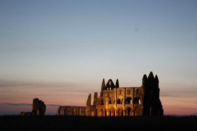 Silhouette of tourists at sunset
