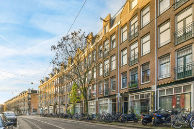 Buildings in city against sky