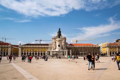 Group of people in front of historical building