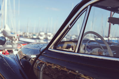 Close-up of car against sky