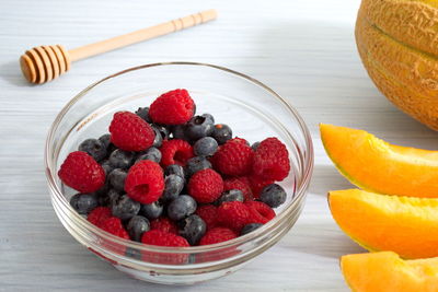 High angle view of strawberries in bowl on table