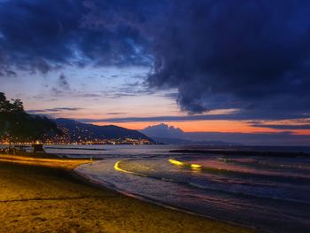 Scenic view of sea against sky at sunset