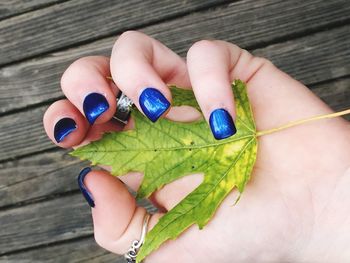 High angle view of woman holding hands