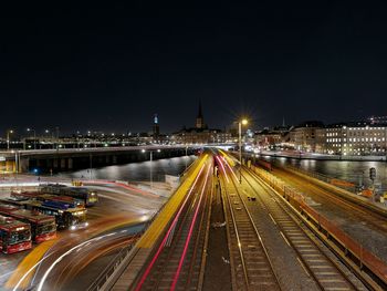 Light trails on city street at night