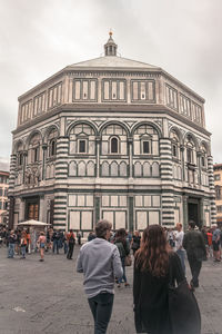 Group of people in front of building