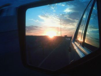 Sunset seen through train windshield