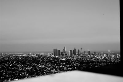 View of cityscape against clear sky