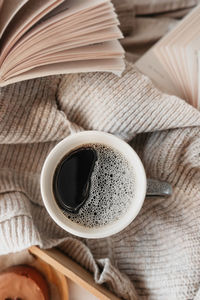 High angle view of coffee cup on table