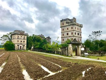 View of historical building against cloudy sky