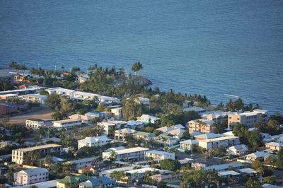 High angle view of townscape by sea