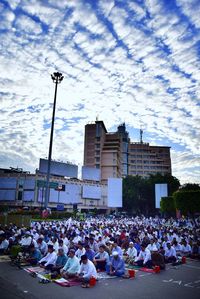 Group of people in front of building