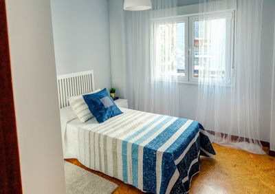 Lounge chairs on bed at home