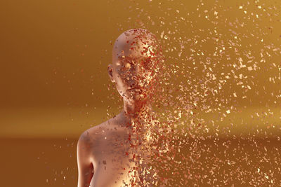 Close-up portrait of shirtless man against water