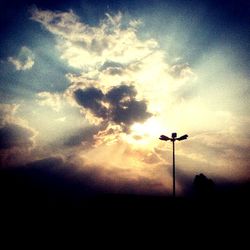 Low angle view of cloudy sky at sunset