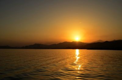 Scenic view of mountains at sunset