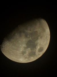 Low angle view of moon in sky at night