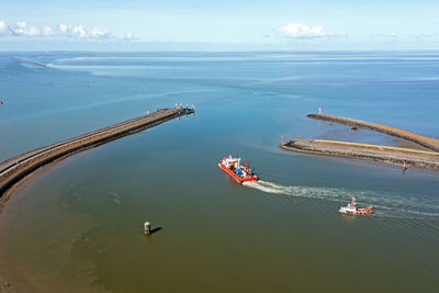 Aerial from a fisher boat leaving the harbor in harlingen friesland the netherlands