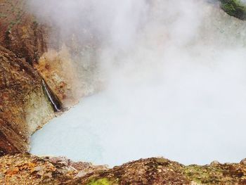 Smoke coming out from boiling lake