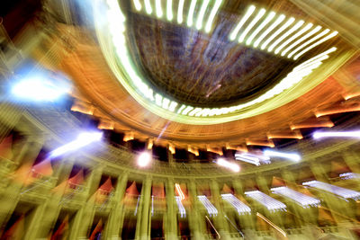 Low angle view of illuminated ceiling in building