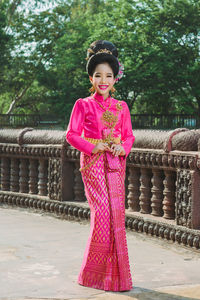 Portrait of smiling girl in traditional clothing