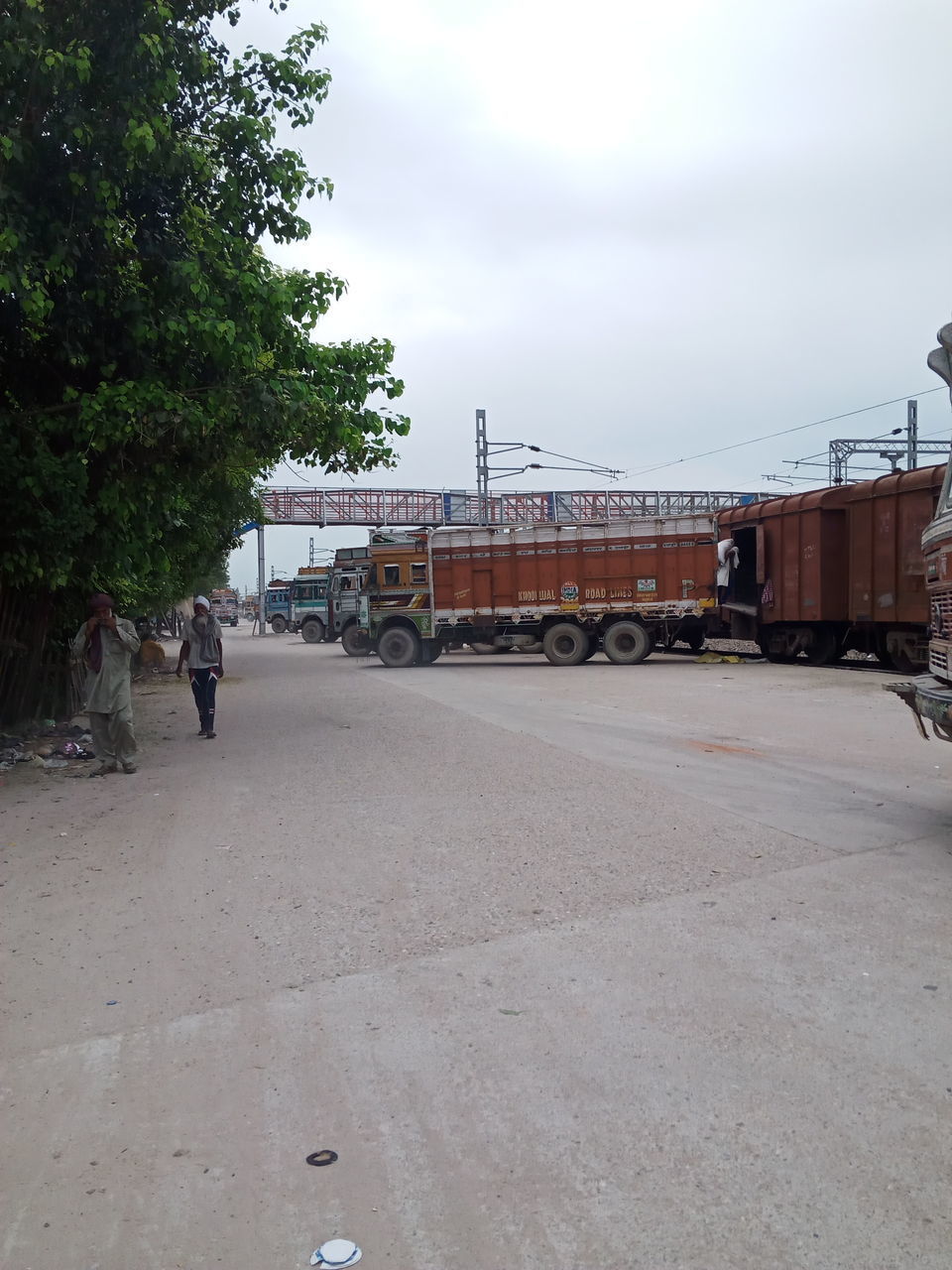 VIEW OF TRAIN ON STREET IN CITY