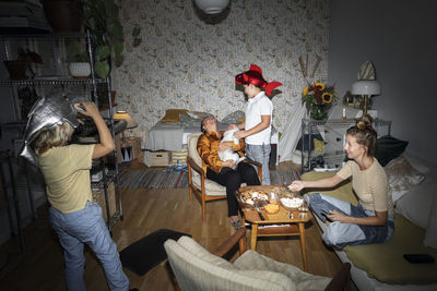 Family playing in living room