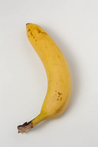 Close-up of banana against white background