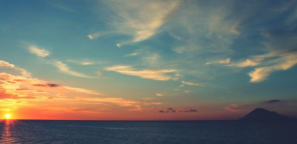 Scenic view of sea at sunset