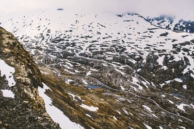 Scenic view of snow covered mountain against sky