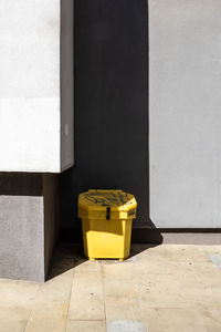 Close-up of yellow grit bin