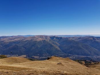 Scenic view of mountains against clear sky