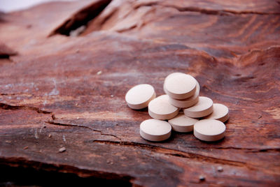 Close-up of objects on wooden surface