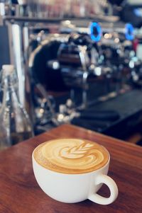 Close-up of coffee served on table