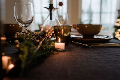 Scandinavian tea light candle on a decorated dinner table setting