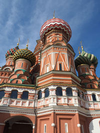 Low angle view of church against cloudy sky