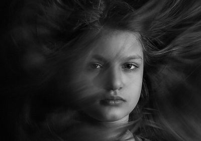 Close-up portrait of young woman