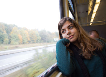 Portrait of beautiful woman in car