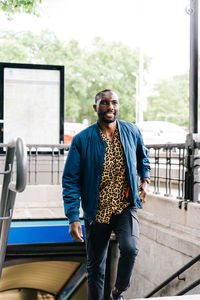 Young man walking outdoors