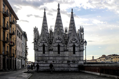 Santa maria della spina in town against sky