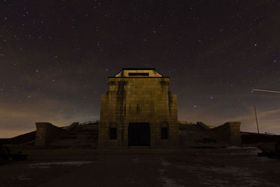 Low angle view of building against sky at night