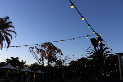 Low angle view of street light against clear sky